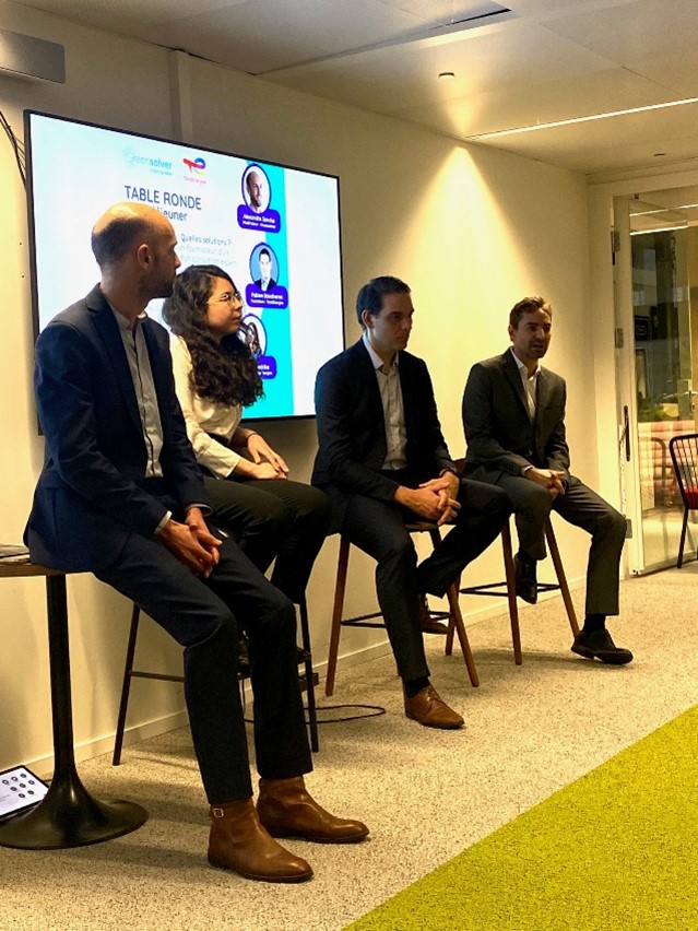 Conference with speakers, screens and people 2