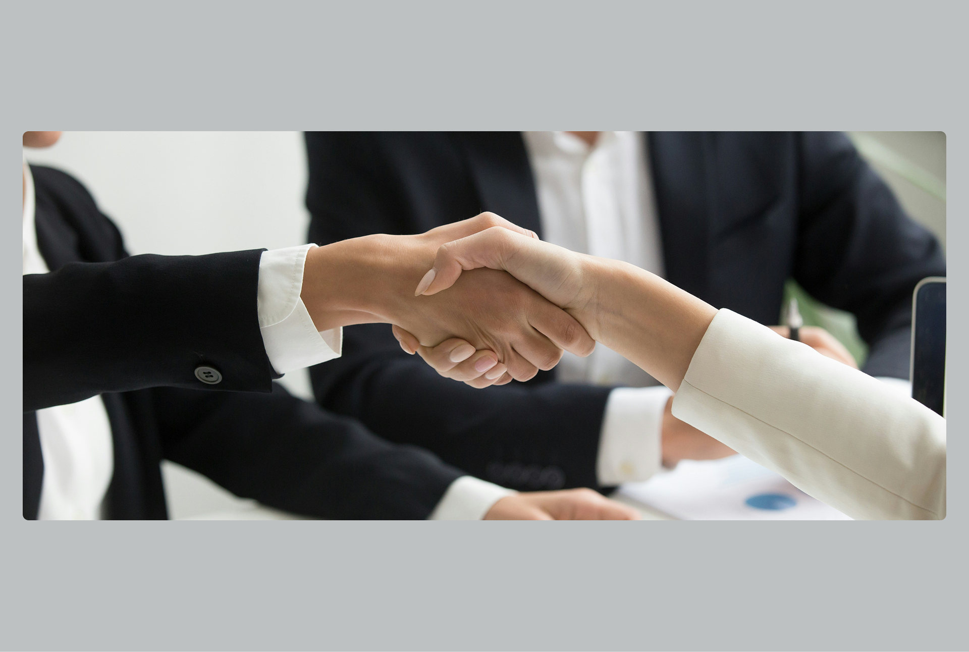 Hands shaking during a meeting