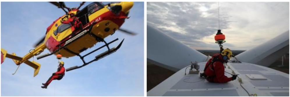 Helicopter at the top of wind turbines with safety staff